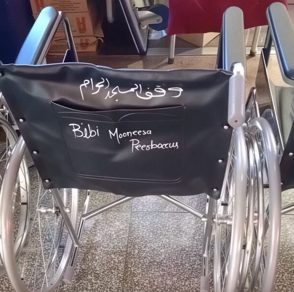 Wheel Chair Distribution For Pilgrims in Makkah